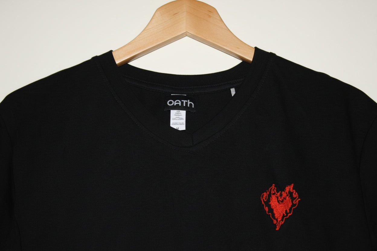 Black t-shirt with a red logo on a white background