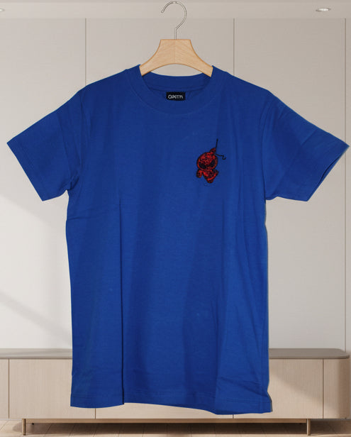 Blue t-shirt with a red spiderman cartoon design on a white background