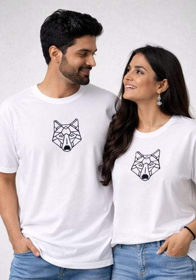 Two people wearing white t-shirts with wolf designs on a white background